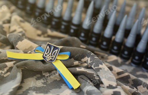 Preview: Ukrainian symbol and a machine gun belt on the camouflage uniform