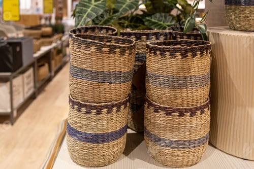 Preview: Wicker baskets for the home on a store display.
