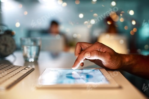 Preview: Cropped shot of an unrecognizable person using a digital tablet at a office