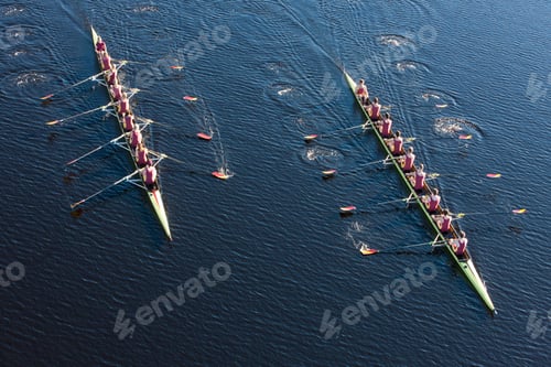 Preview: Elevated view of two rowing eights in water