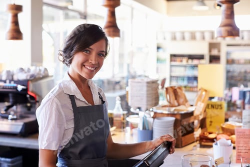 Preview: Portrait Of Female Employee Working At Delicatessen Checkout