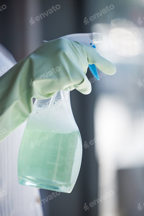 Preview: Cleaning, spray and gloves with hand of woman for disinfection, hygiene and bacteria with housekeep