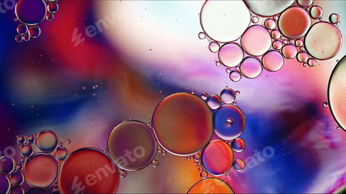 Preview: Abstract Colorful Food Oil Drops Bubbles and spheres Flowing on Water Surface