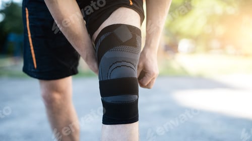 Preview: Knee support brace on male legs