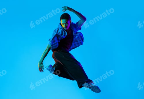Preview: African man portrait in studio on colorful background