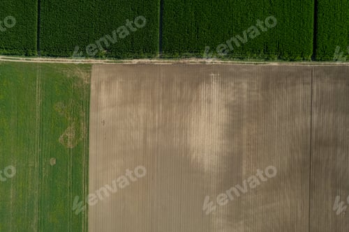 Preview: aerial photo shot of mixed cultivated and harvested rural plain land