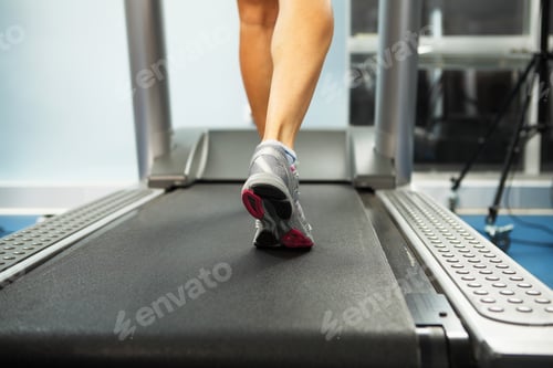 Preview: Image Of Female Foot Running On Treadmill