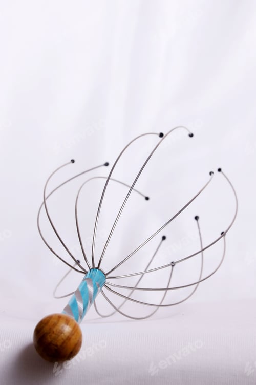 Preview: Vertical shot of scalp massager on white background