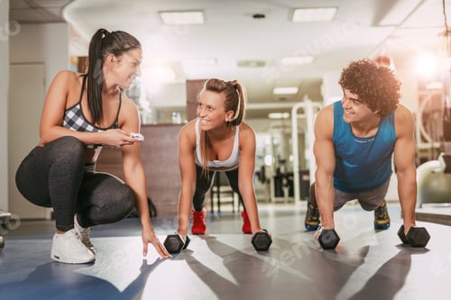 Preview: Couple Exercising With Instructor