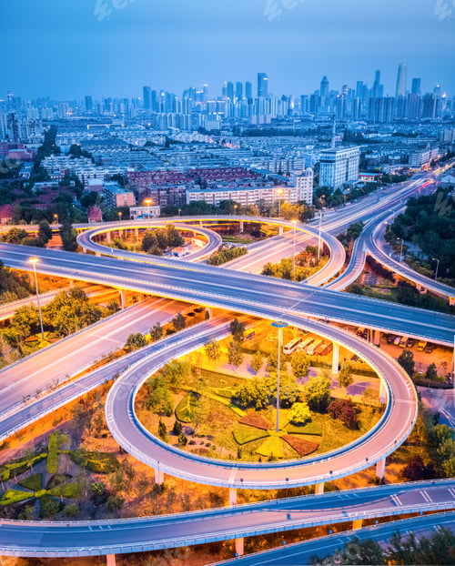 Preview: modern interchange road with city skyline