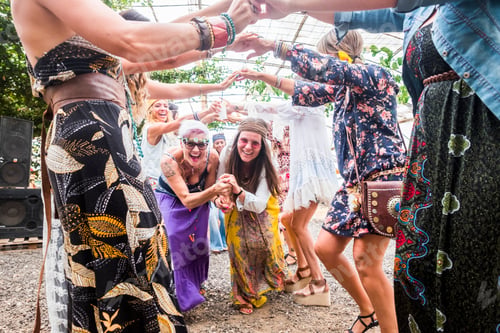 Preview: group of female people enjoying the party festival celebrating with dance and joy and playful
