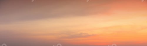 Preview: Sunset sky. Abstract nature background. Dramatic blue and orange, colorful clouds at twilight time.
