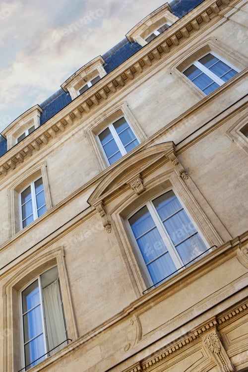 Preview: Facing a classic French architecture