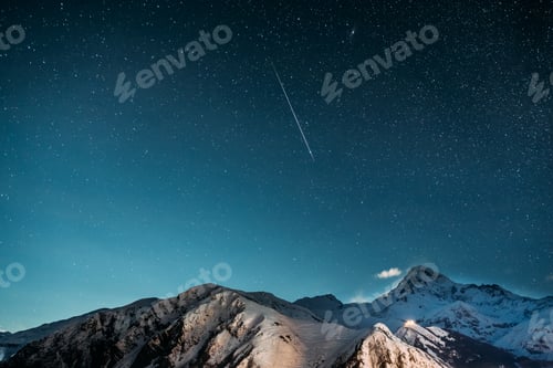 Preview: Stepantsminda, Georgia. Natural Winter Night Starry Sky With Glo