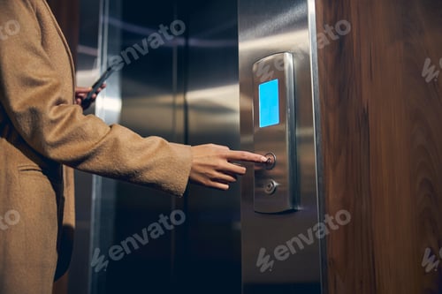 Preview: Woman wearing autumn clothes in the elevator