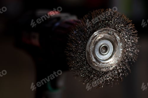 Preview: Close-up of a drill on a rusty metallic table