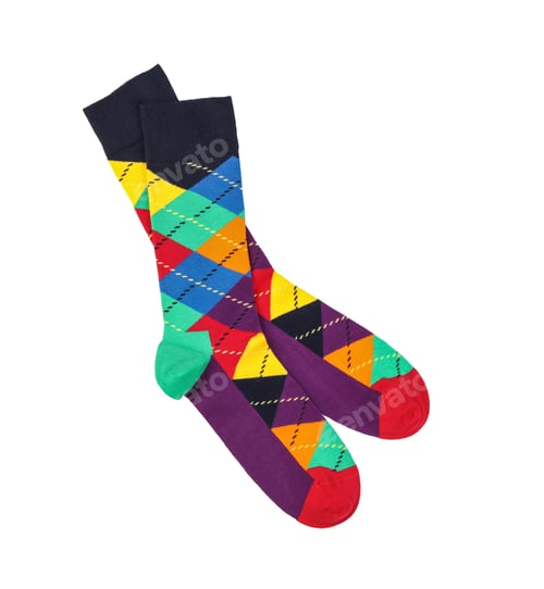 Preview: Colorful socks on white background, top view