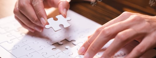 Preview: Concept of integration and startup with puzzle pieces merger with teamwork of business worker