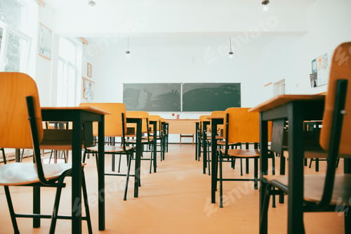 Preview: Elementary classroom, no kid or teacher, with chairs and tables. Education concept.