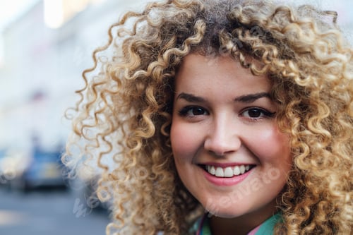 Preview: Young business woman smiling outdoor. Close up.