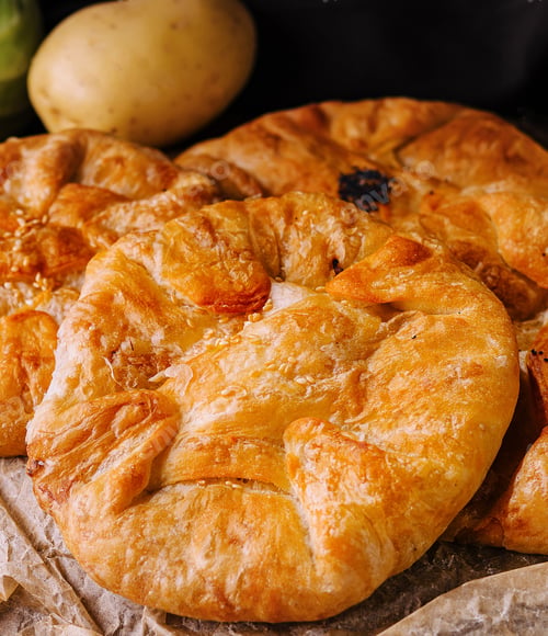 Preview: Cooking traditional pies with potatoes close up