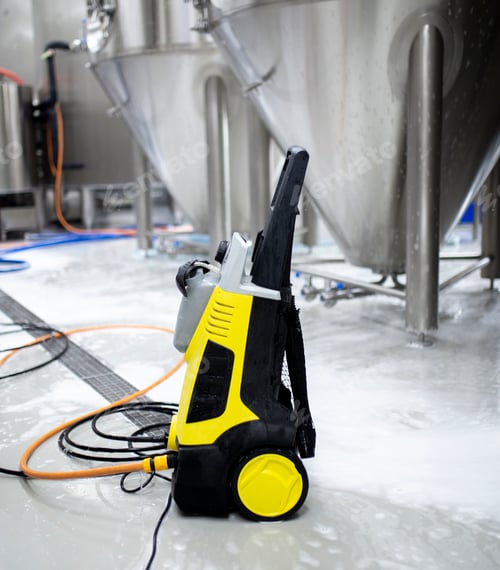 Preview: a high pressure water cleaner of black and yellow color, put on the floor in warehouse