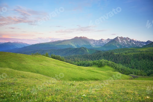 Preview: Mountain green valley during the sunset.