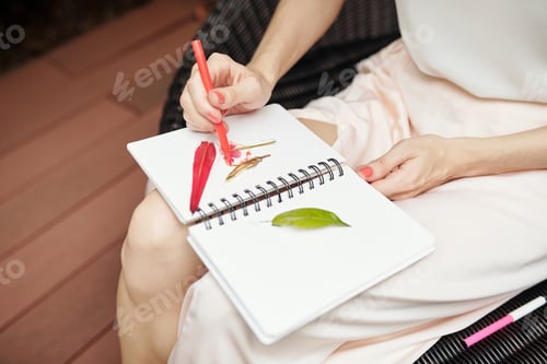 Preview: Creative Woman Sketching Something