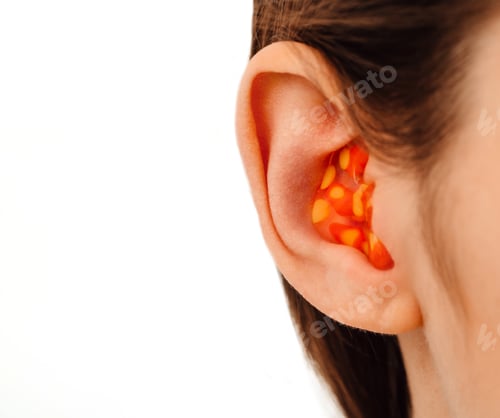 Preview: earplugs for noisy places, personally molded earplugs on ear close-up, isolated on white
