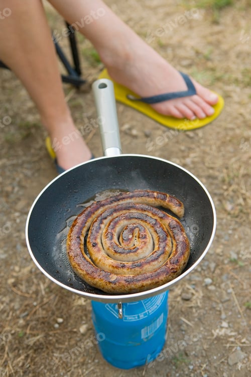 Preview: Sausage in camping stove