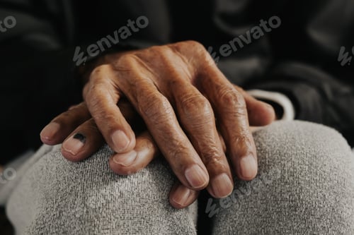 Preview: Close up of male wrinkled hands, old man is wearing vintage tone