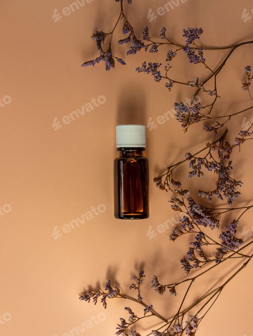 Preview: Herbal essential oil glass bottle mockup beige background Alternative medicine relaxing aromatherapy