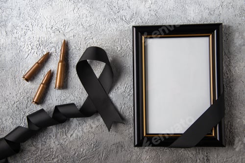 Preview: top view of picture frame with bullets on white surface tank war death soldier