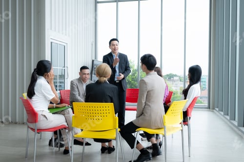 Preview: Group of business people meeting in conference room. Business and education concept.