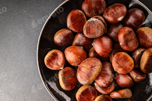 Preview: Edible chestnuts delicious treat tasty snack fresh gourmet food background on table rustic food