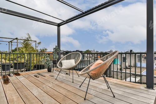Preview: Stylish Rooftop Patio with Modern Chairs
