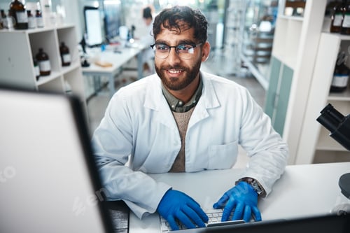 Preview: Laptop, science and smile with man in laboratory for development, innovation or research. Computer,