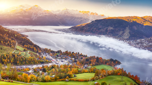 Preview: Spectacular autumn view of lake meadows trees and mountains in Sell Am See