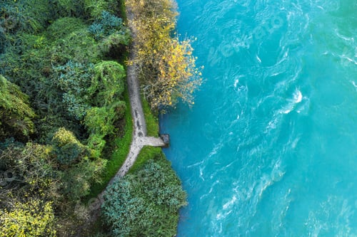 Preview: Aerial view of a river with small pier