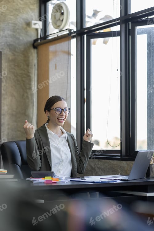 Preview: Happy excited successful business asian woman triumphing in office, Portrait of a cheerful Asian
