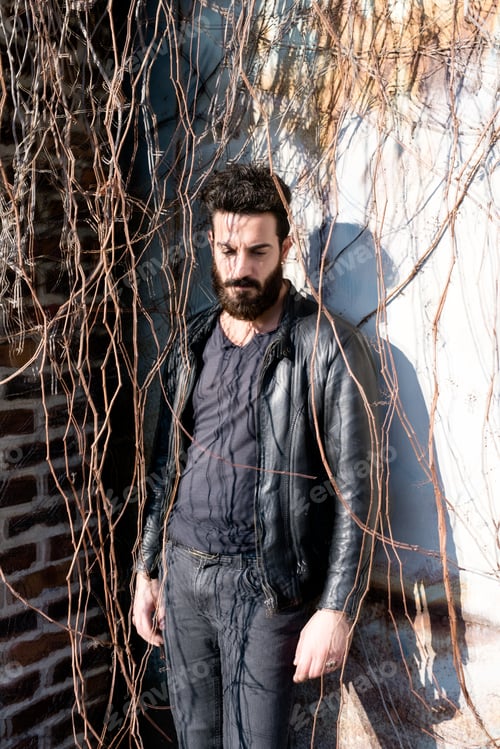 Preview: young man bearded outdoor posing