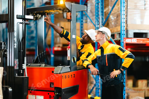 Preview: Warehouse Workers Loading Forklift