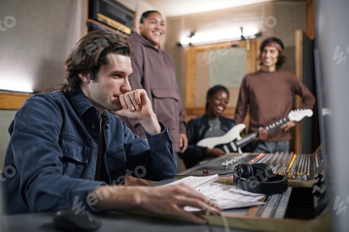 Preview: Band Producing Music in Studio