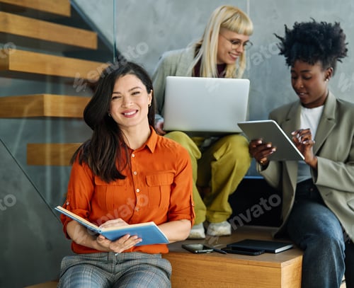 Preview: Young businesspeople having a meeting in the office