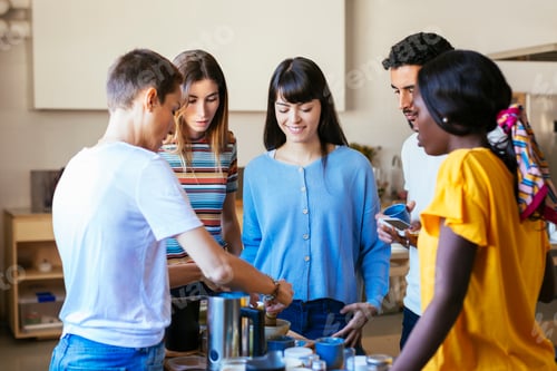 Preview: Friends and instructor in a cooking workshop preparing a drink
