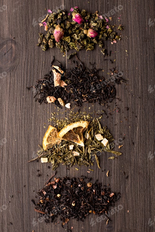 Preview: Several views of tea on a wooden background