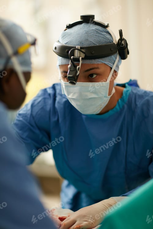 Preview: Surgeons Operating on Patient in Hospital Operating Room