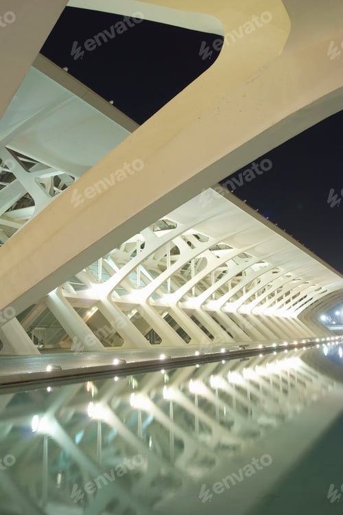 Preview: Abstract view of a modern structure at night with dynamic lighting and reflections