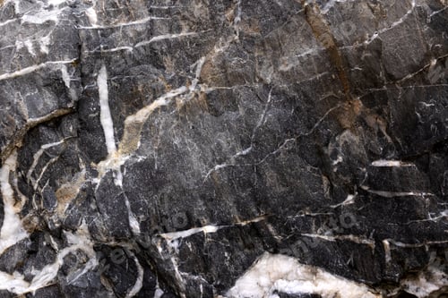 Preview: Background from a photo of a chipped dark marble with white veins and cracks