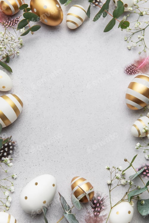 Preview: Easter eggs frame decorating a gray surface with eucalyptus leaves and feathers